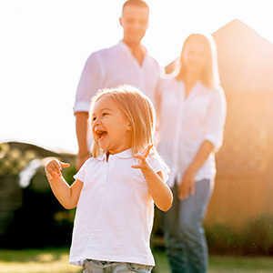 A happy family in the sunlight, illustrating about Maryland child custody court factors